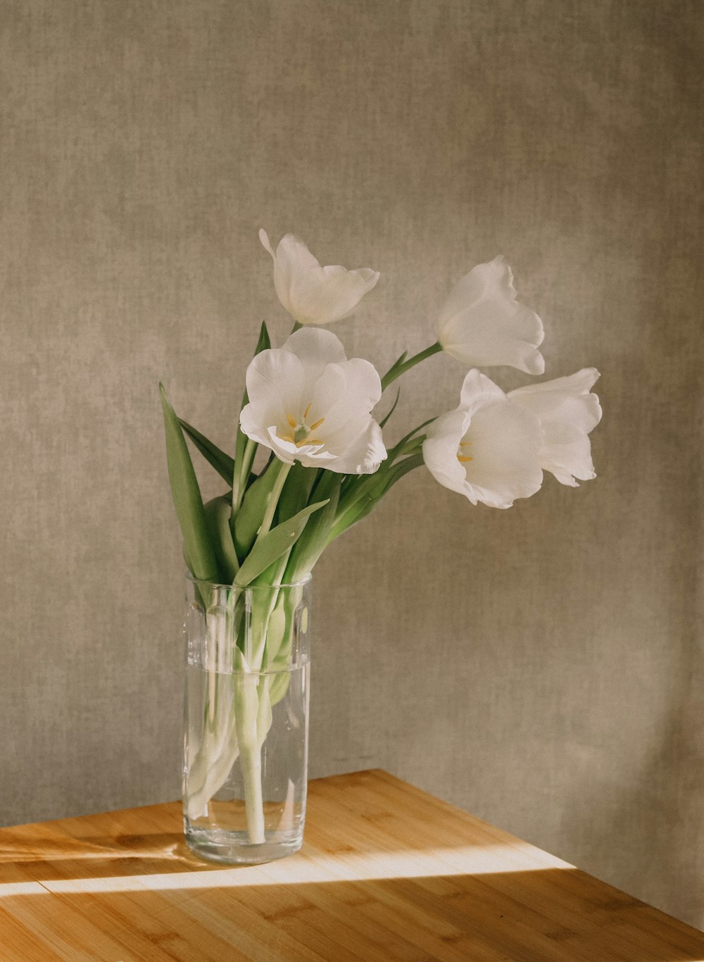 white flower in clear glass vase