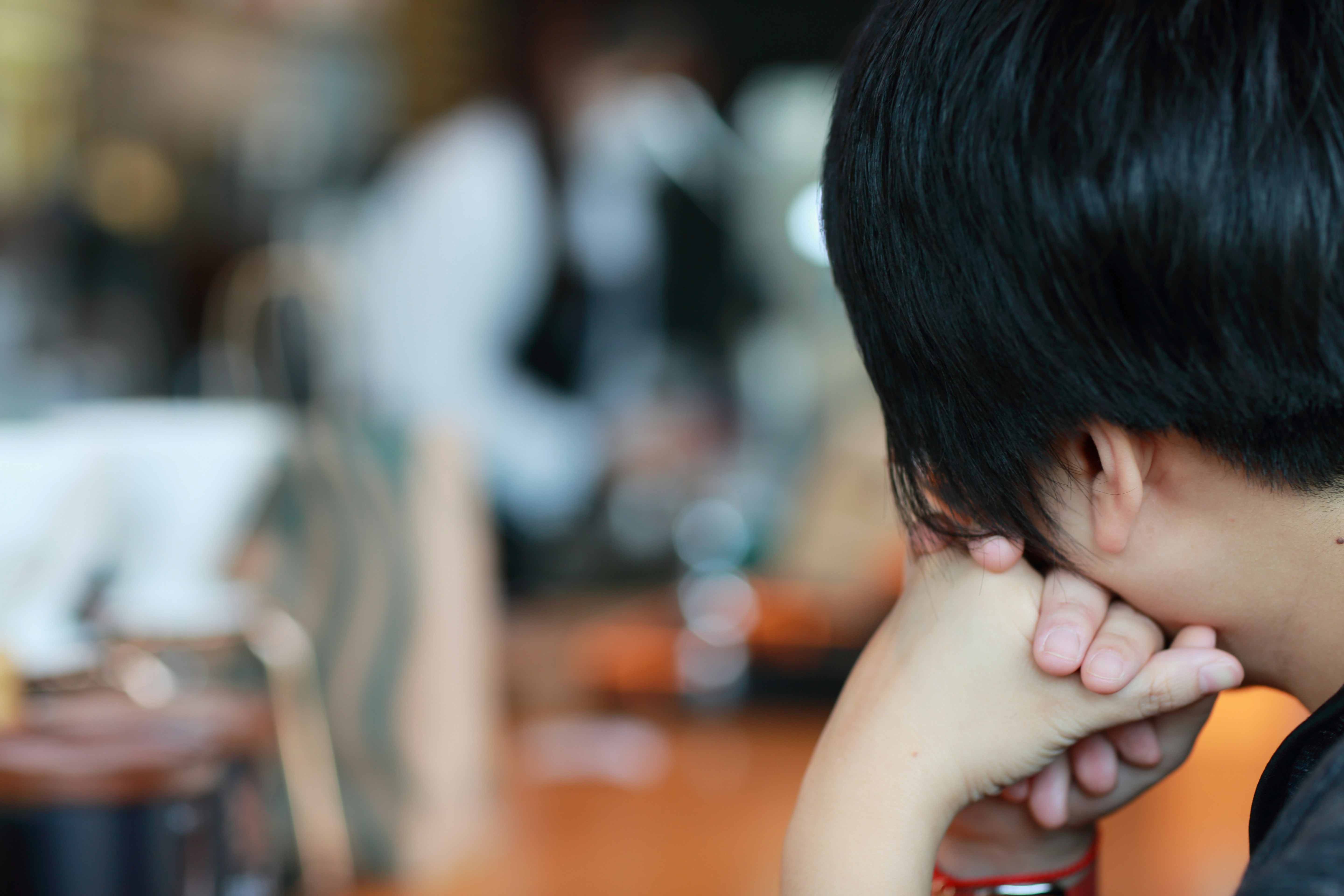 boy in white tank top