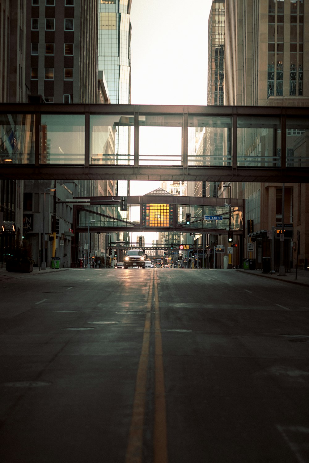 people walking on sidewalk inside building