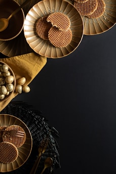 Colorful assortment of millet-based cookies arranged on a wooden platter