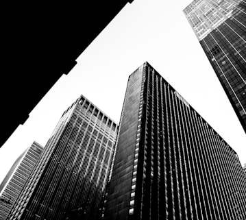 grayscale photo of high rise buildings