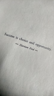 Text on a textured paper background reads 'Success is choice and opportunity' attributed to Harrison Ford.