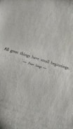 A motivational quote printed in black text on a textured white paper. The quote reads: 'All great things have small beginnings.' The author's name, Peter Senge, is printed below the quote, centered and flanked by horizontal lines.