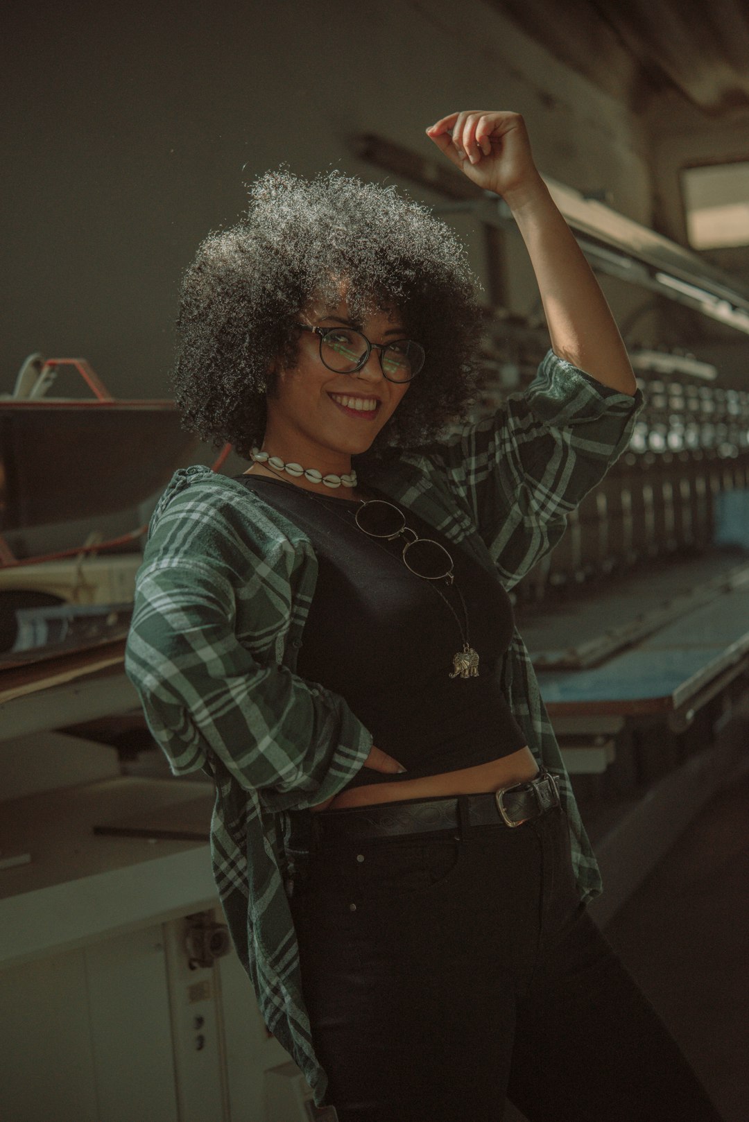 woman in black and gray plaid long sleeve shirt