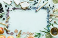 A beautifully arranged flat lay of beauty essentials and natural elements.