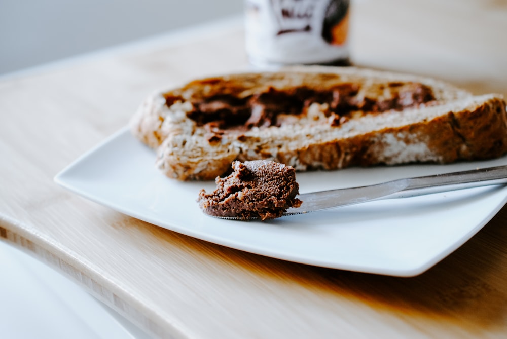 brown bread on white ceramic plate