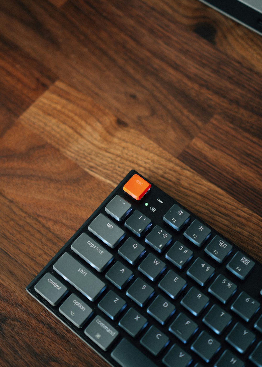 black and orange computer keyboard