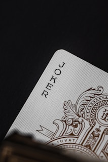 white and black card on black surface