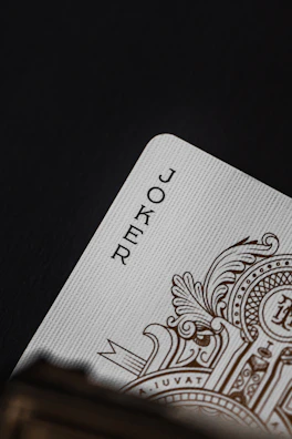 Close-up of the 'Las Meninas' card showcasing linen texture and gold foil edges.