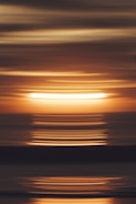 sunset over the sea with clouds