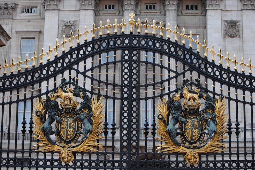 black metal gate with blue and white lion and lion print