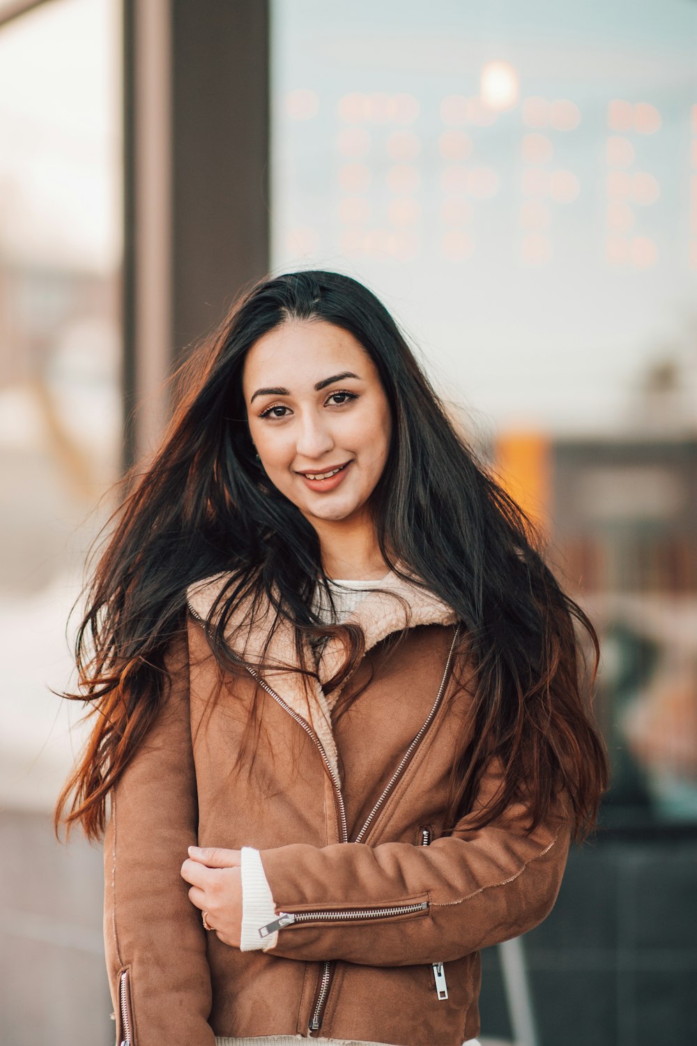 woman in brown leather jacket