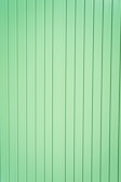 green and white striped textile