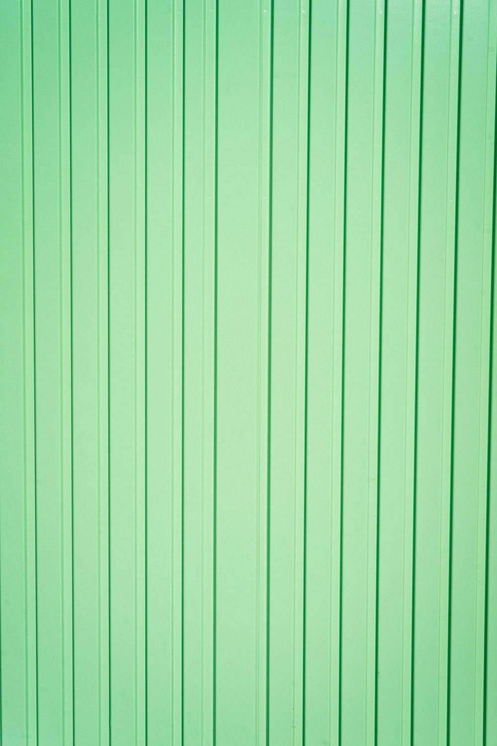 green and white striped textile