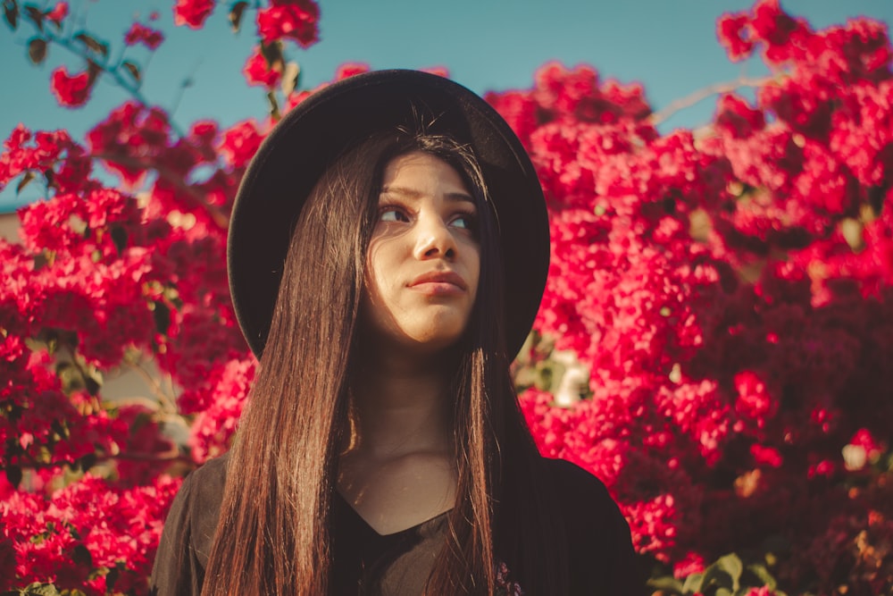 woman in black hat and black shirt