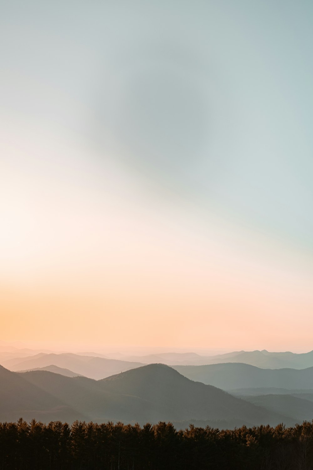 silhouette of mountains during daytime