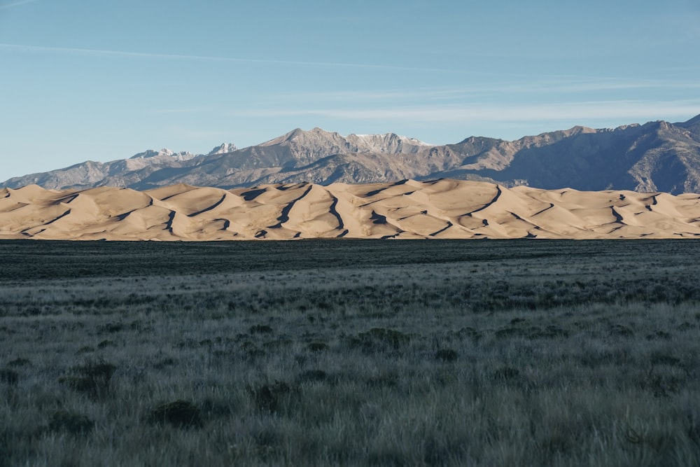 brown mountains under blue sky during daytime