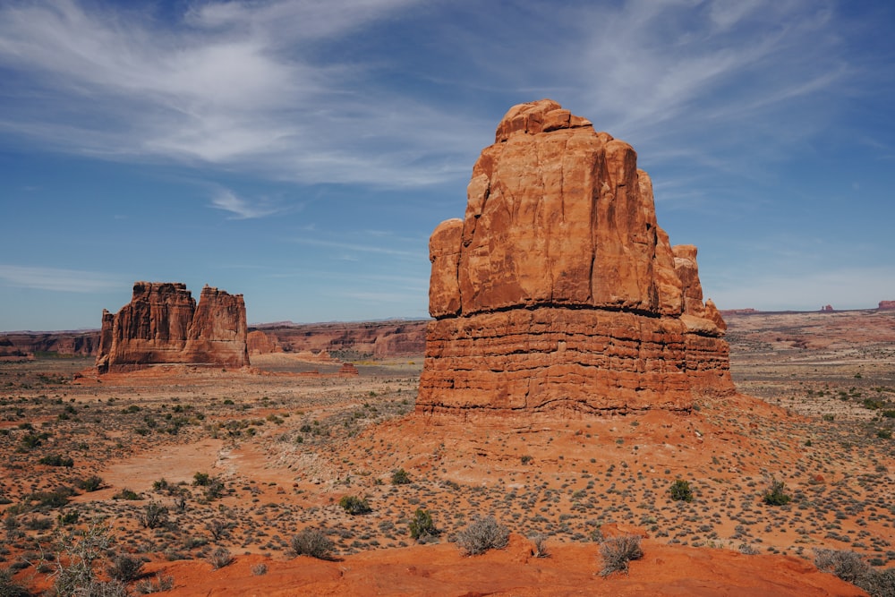 brown rock formation under blue sky during daytime