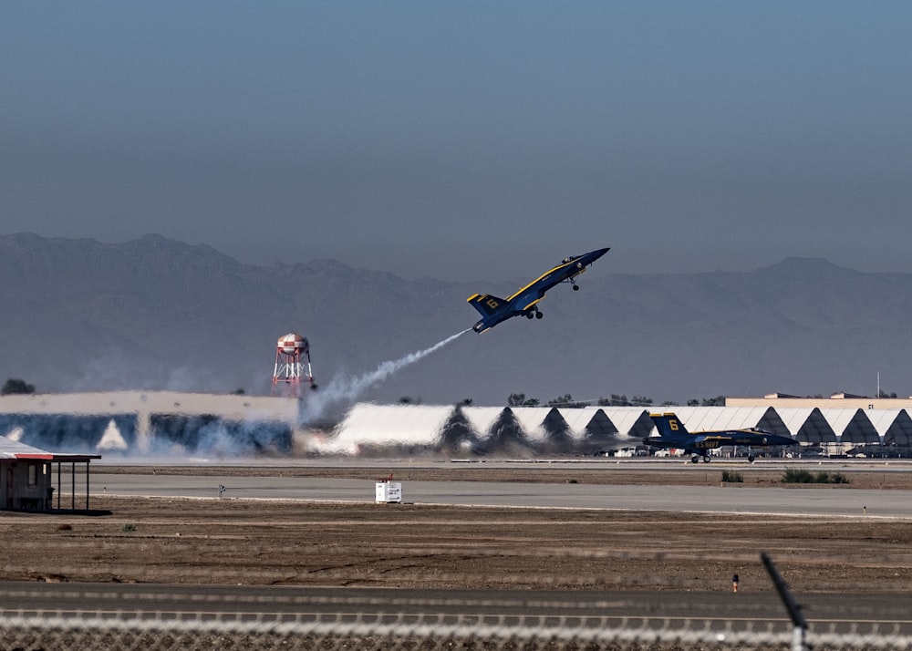 black and yellow plane on air during daytime