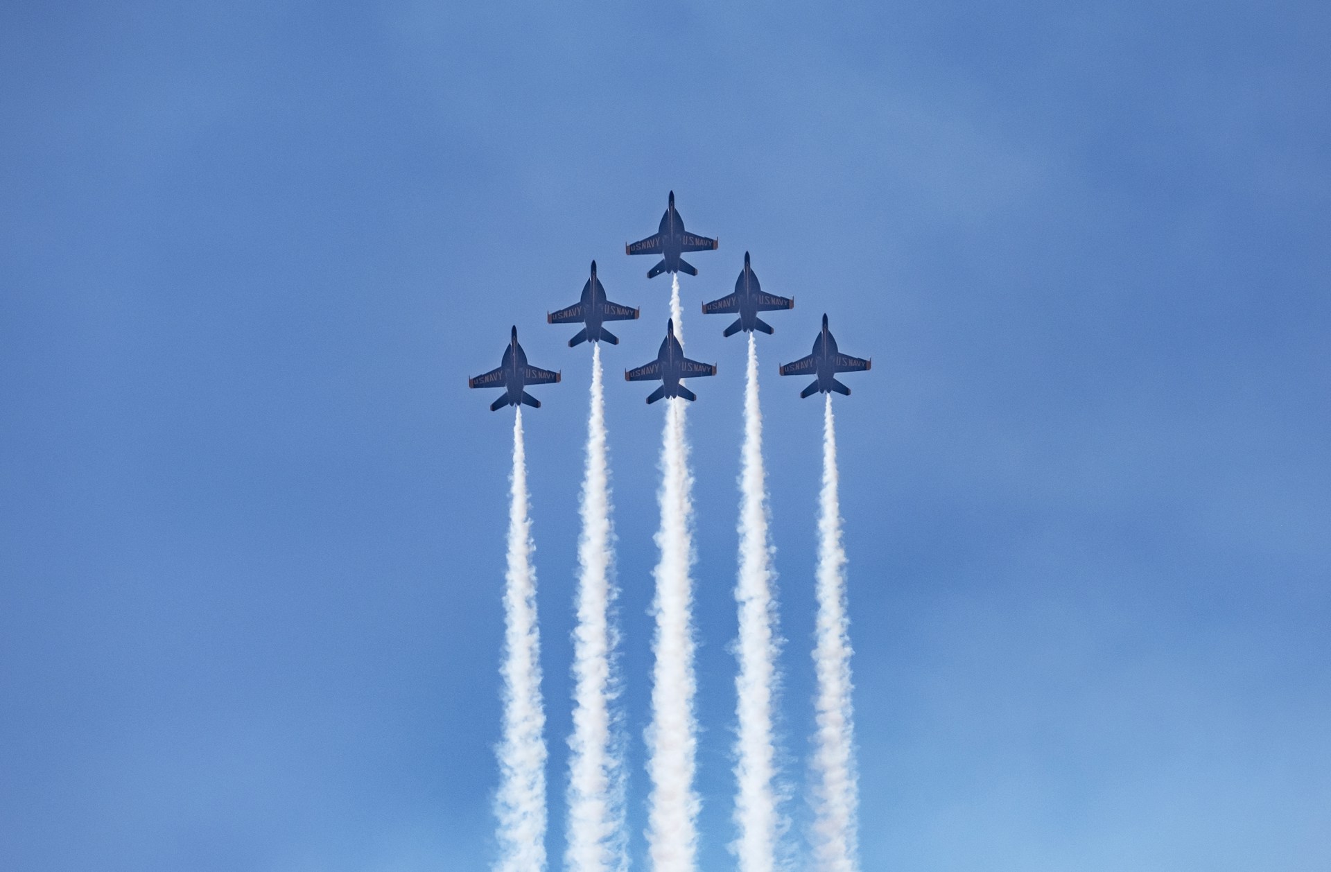 four jet planes in mid air