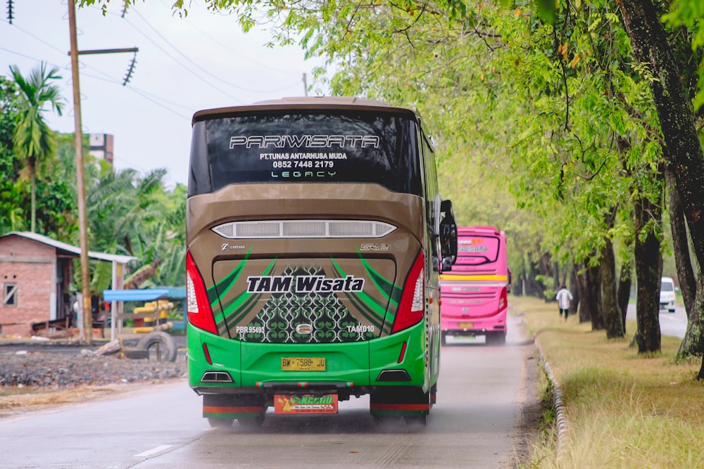 green and black car on road during daytime