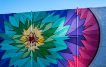 blue pink and yellow flower wall art