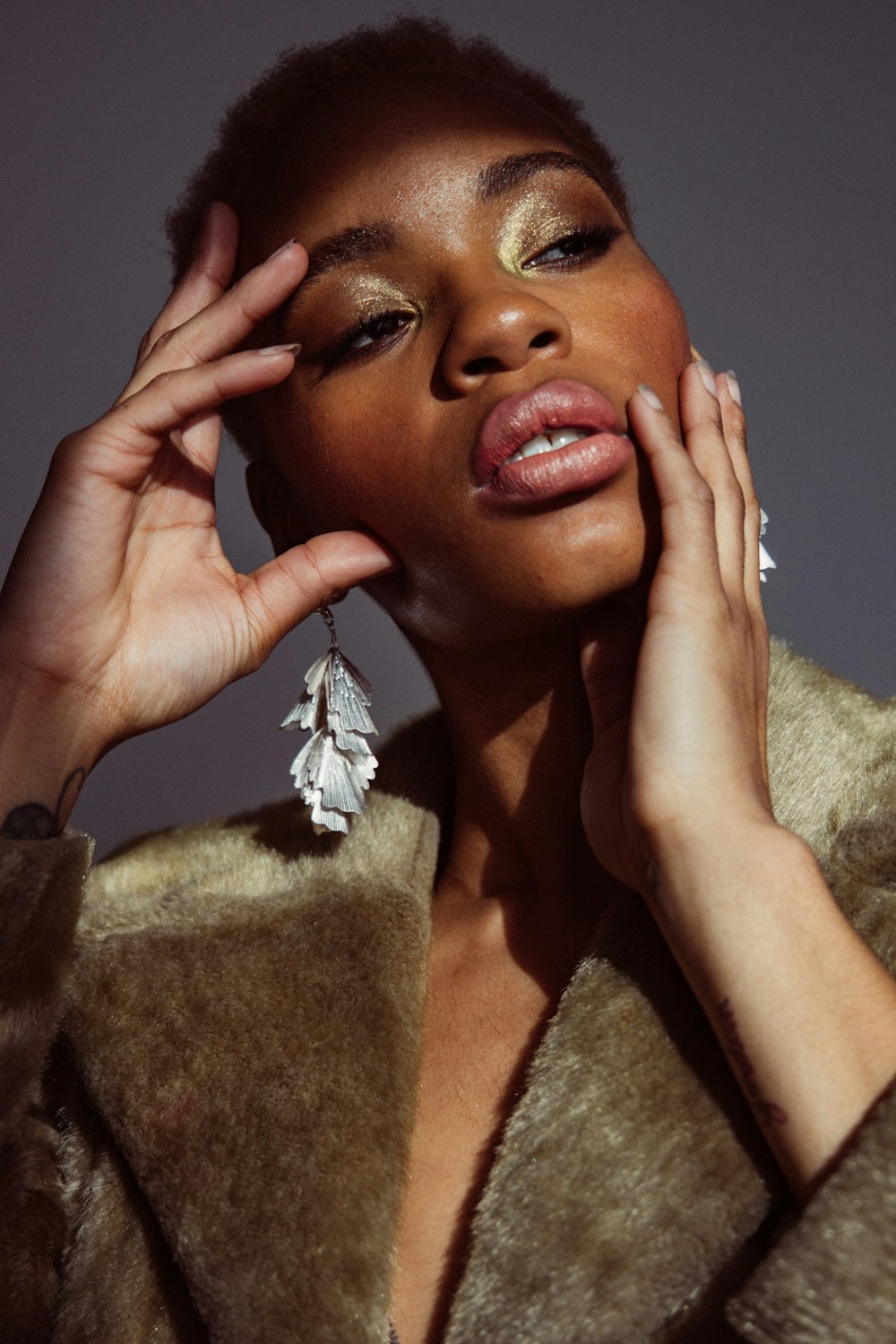 woman in brown fur coat