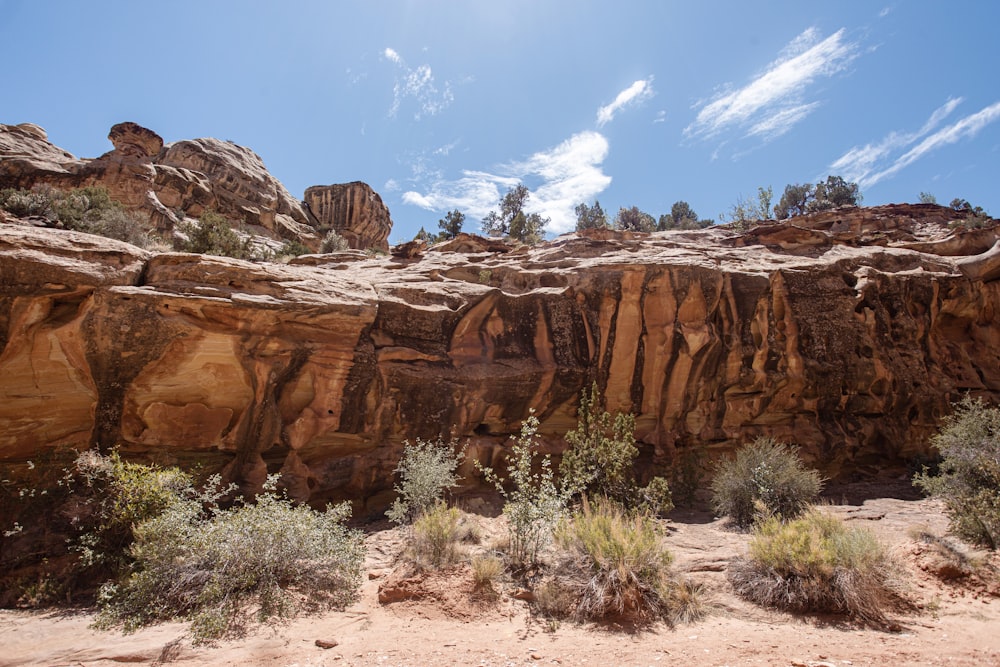 brown rock formation under blue sky during daytime