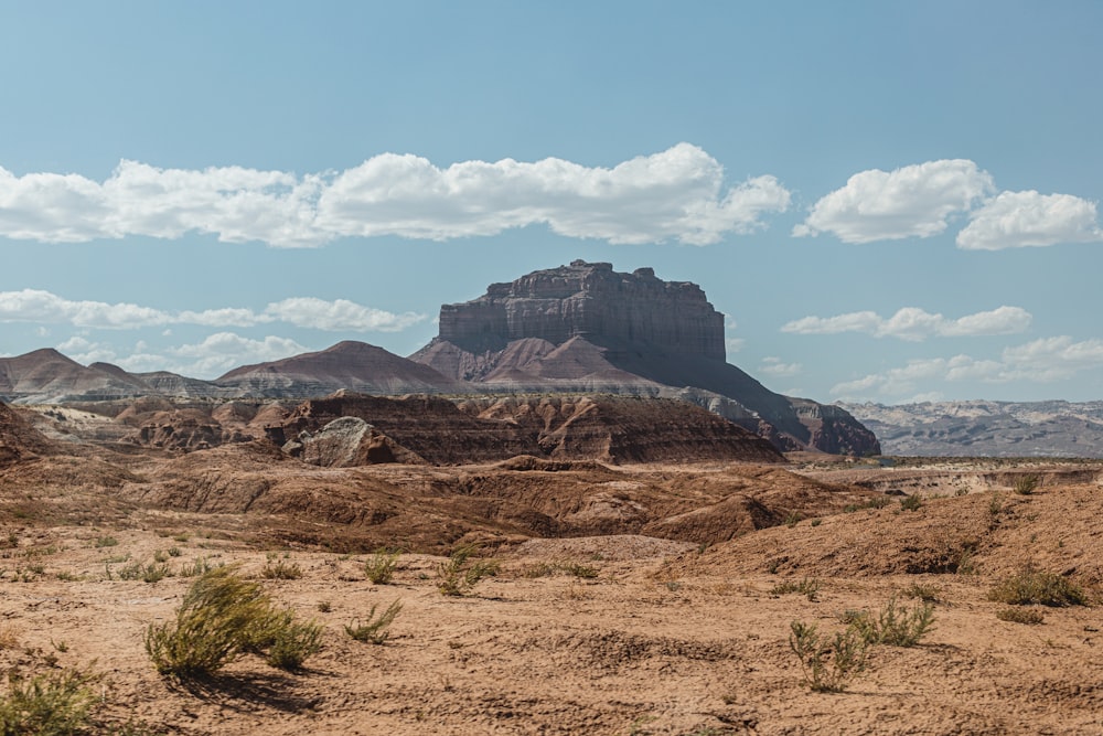 brown rocky mountain under blue sky during daytime