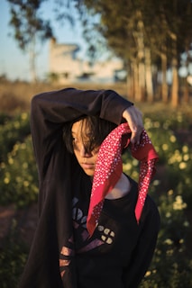 woman in black hijab and black long sleeve shirt