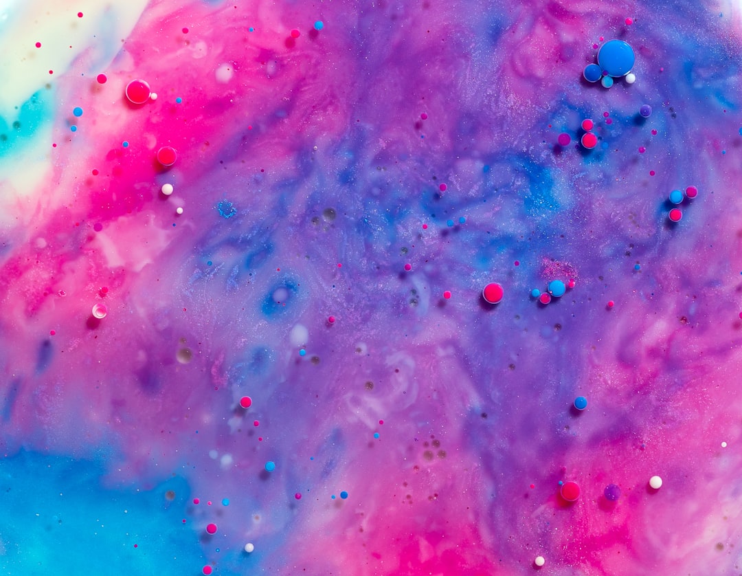 blue and pink bubbles on water