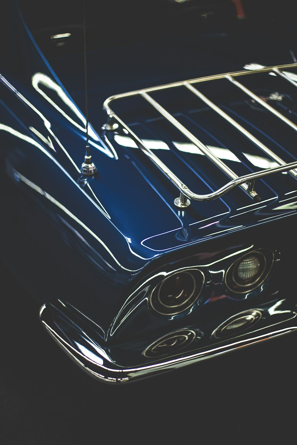 blue and white car with white metal frame