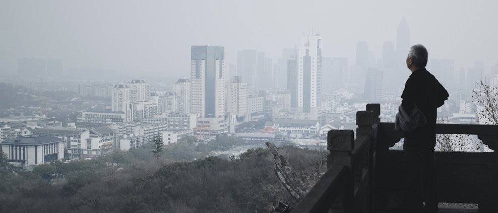 city skyline during foggy day