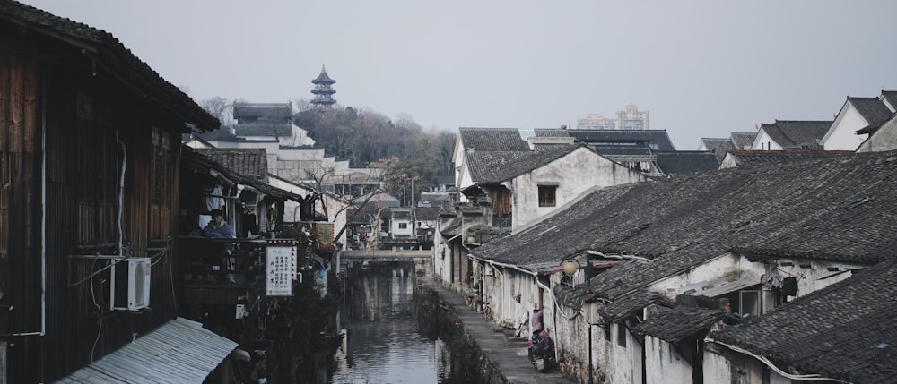 houses near river during daytime