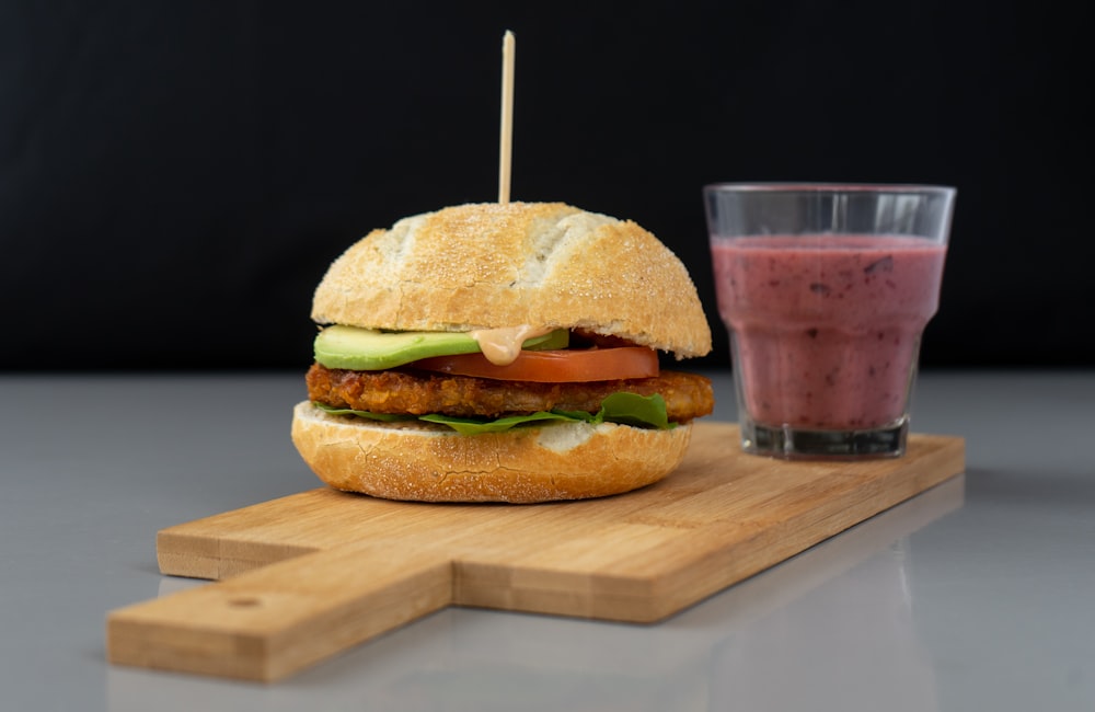 burger on brown wooden table