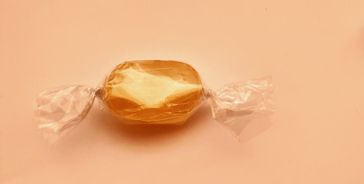 yellow plastic pack on white table