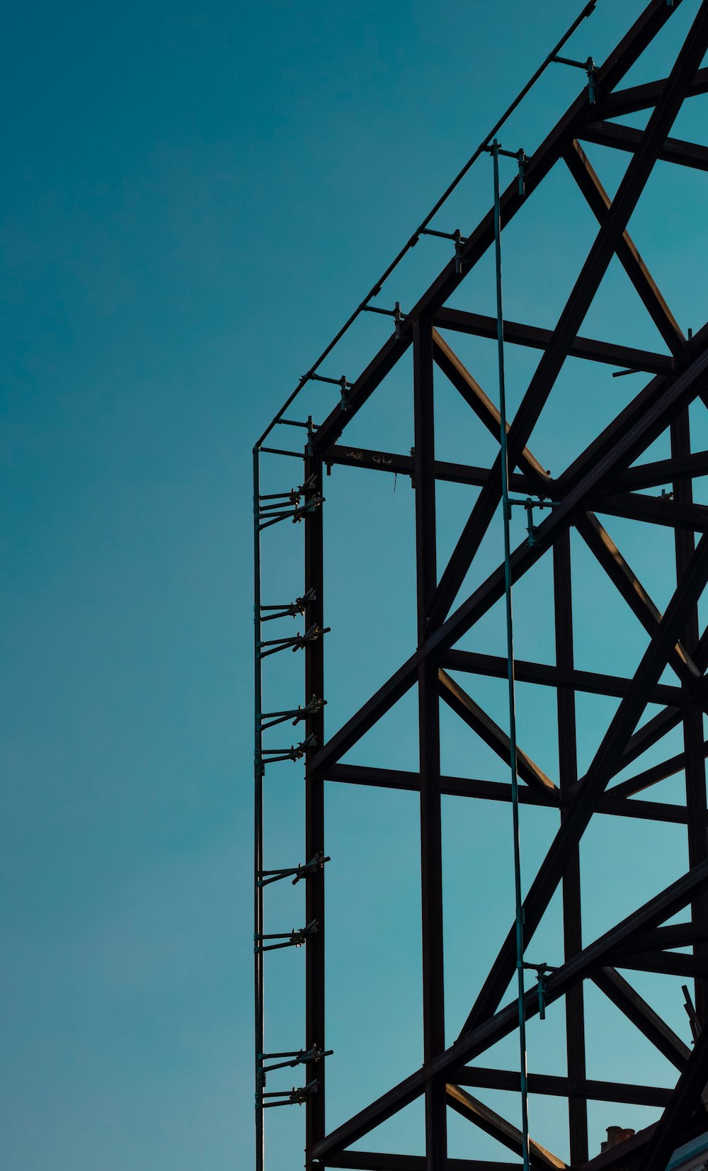 black metal frame under blue sky during daytime