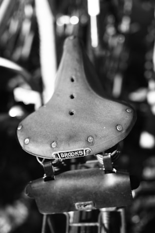 Close-up of a bike saddle with pressure mapping highlights, illustrating the fitting process.