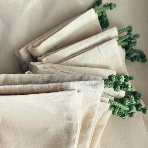 white and green floral textile