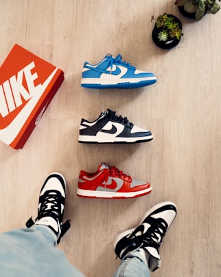 black white and red nike sneakers