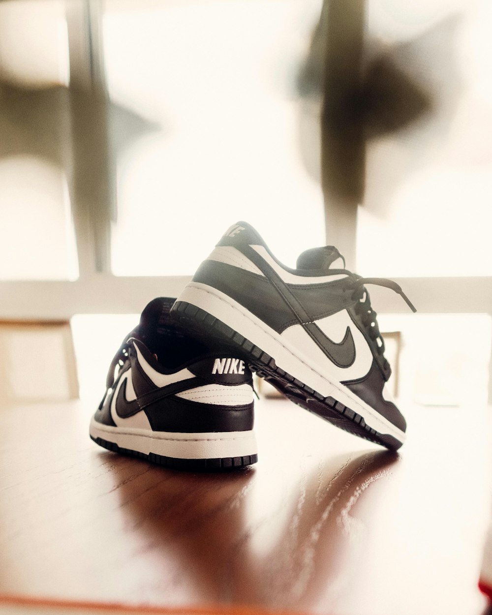 black and white nike athletic shoes