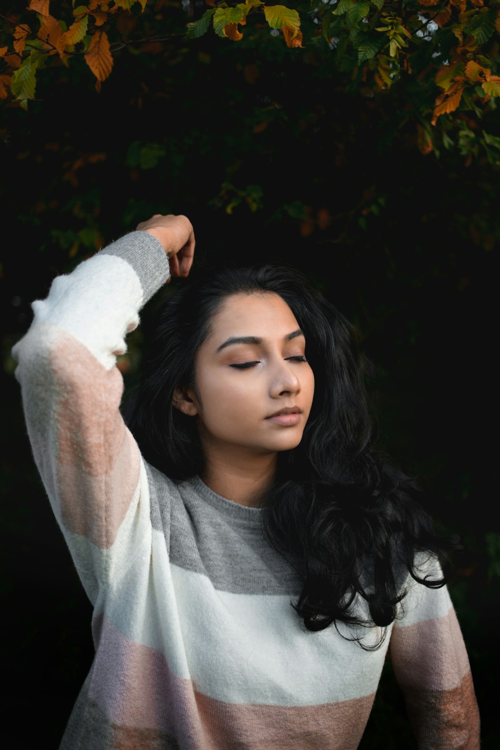 woman in white long sleeve shirt