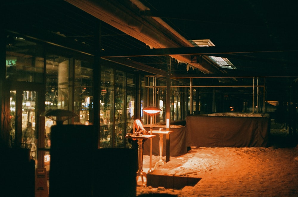 brown wooden table near window