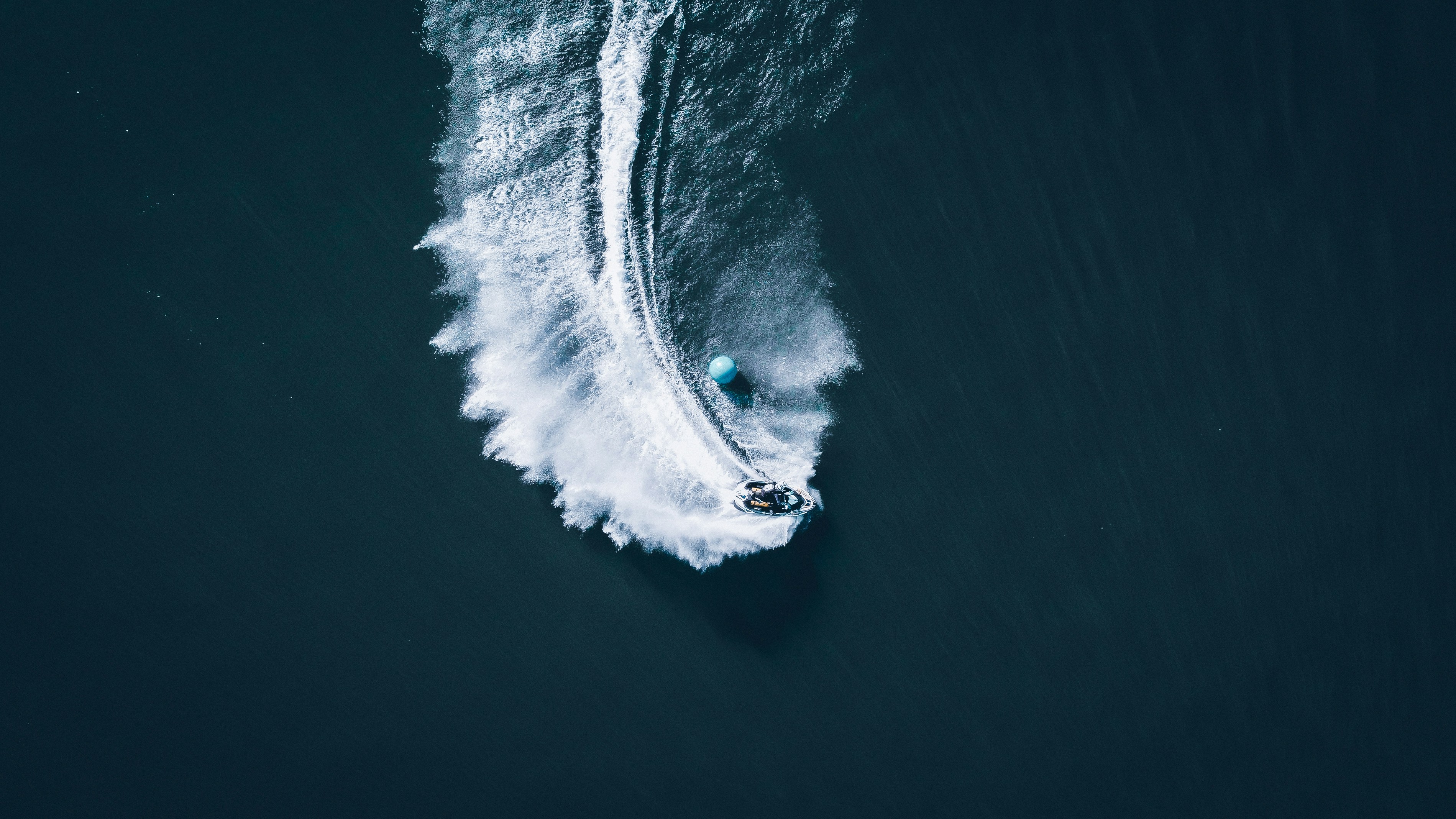 aerial view of white boat on water