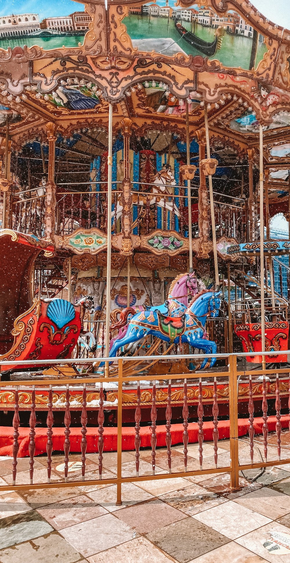 blue red and yellow dragon carousel