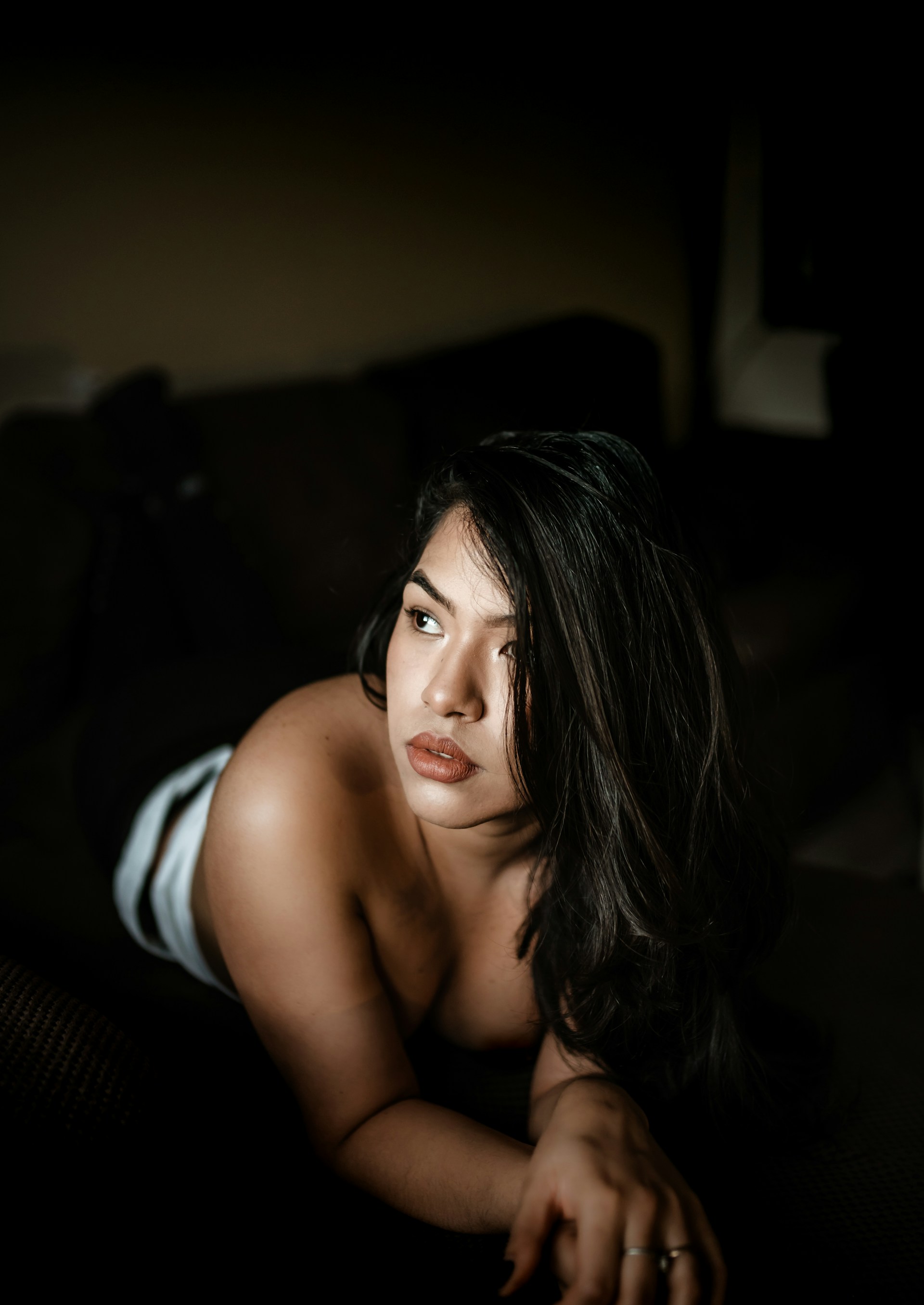 woman in black and white striped tank top