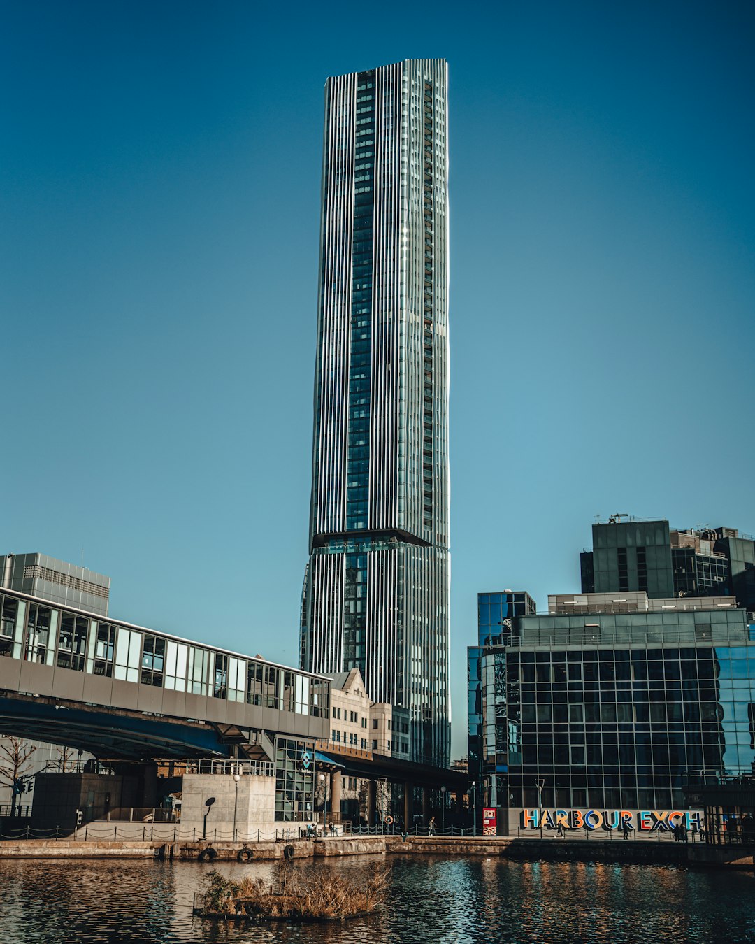 white and blue concrete building under blue sky during daytime