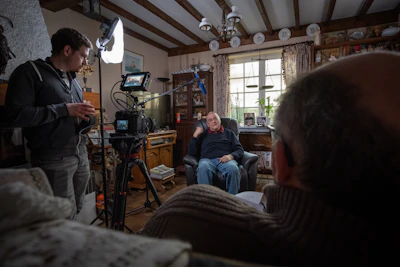 people sitting on chair inside room