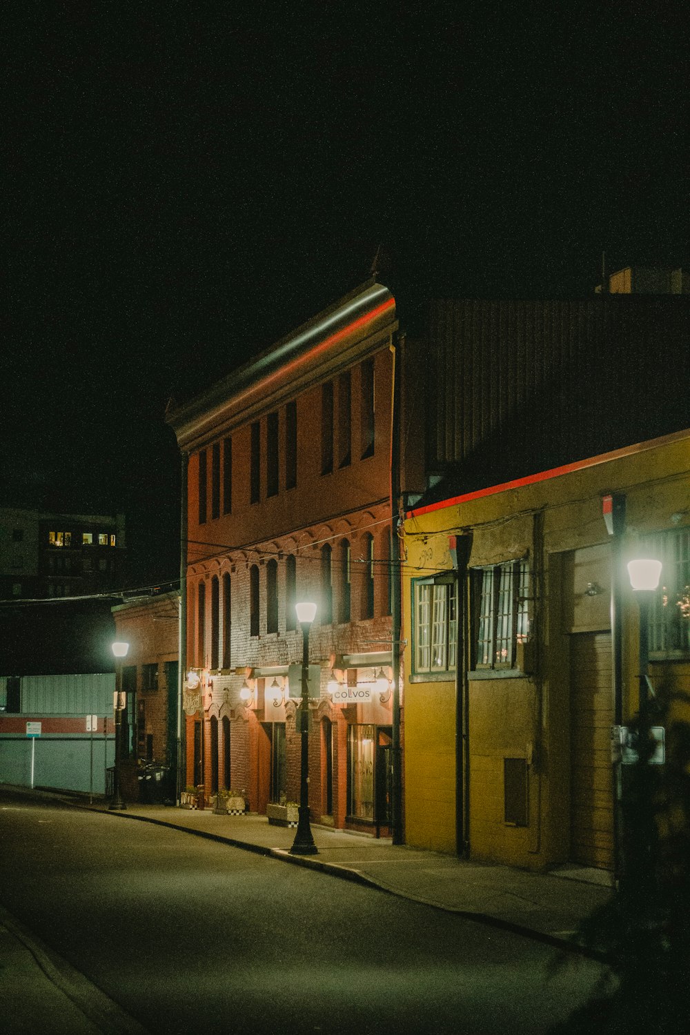 brown and white concrete building during nighttime