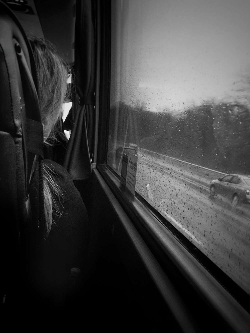 grayscale photo of car window